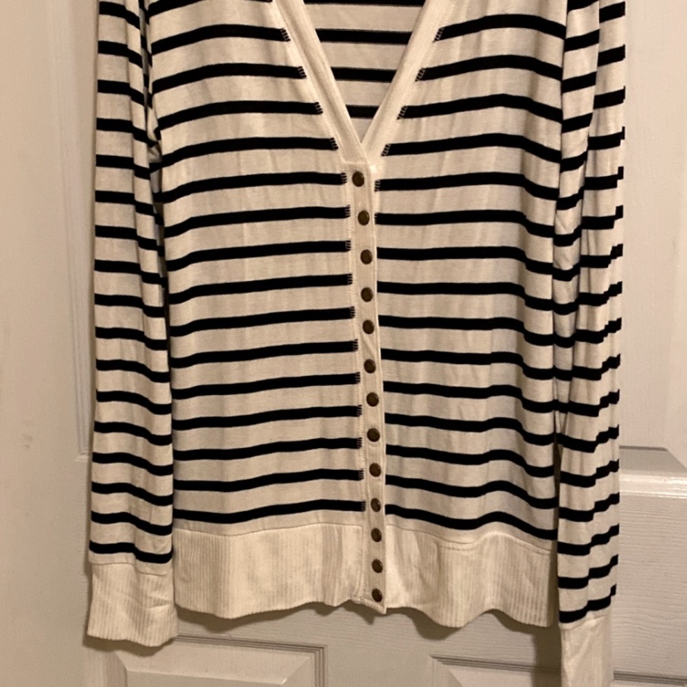 Never worn white cardigan with black stripes.
